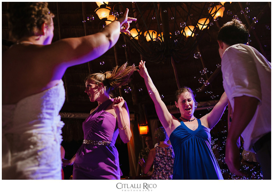 guests dancing at a wedding reception in Azul Beach in Puerto Morelos